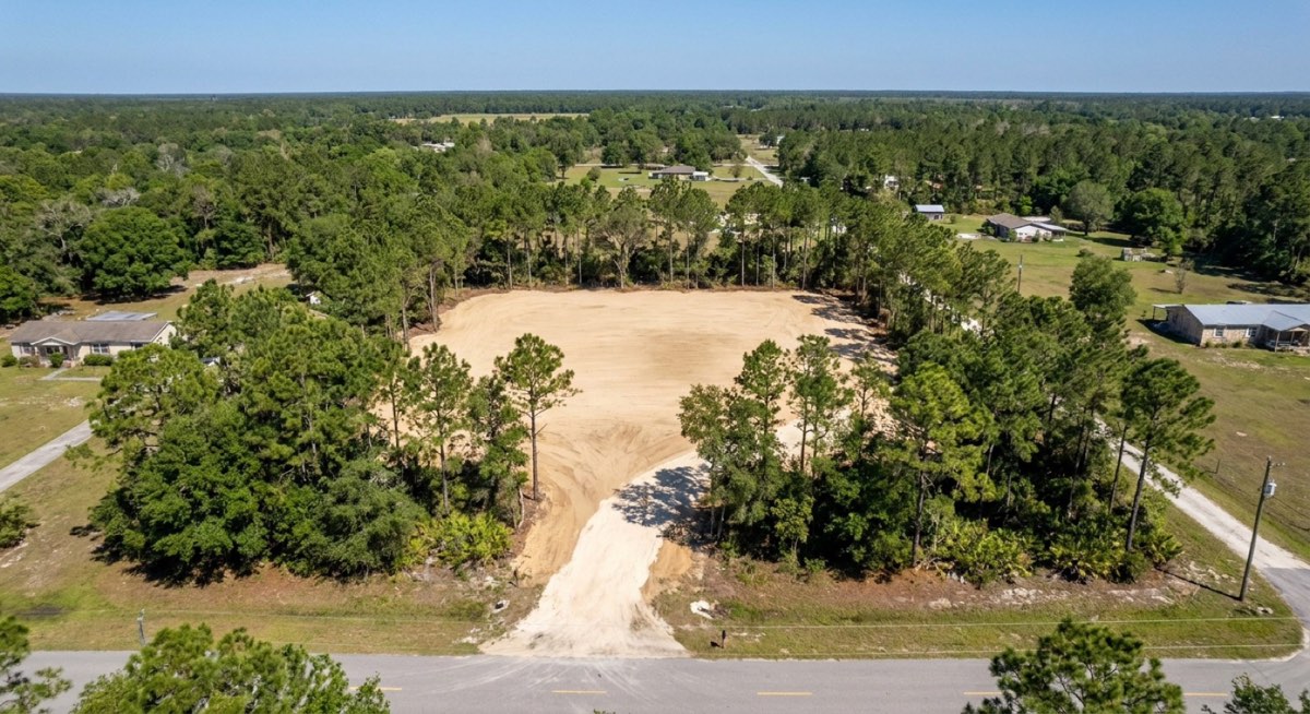 Aerial view of a freshly cleared and graded homesite lot near Gainesville FL